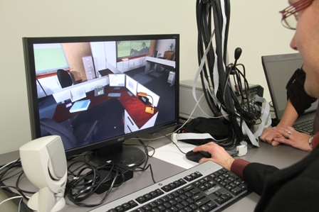 Client participating in a study that examins the application of virtual reality to TBI